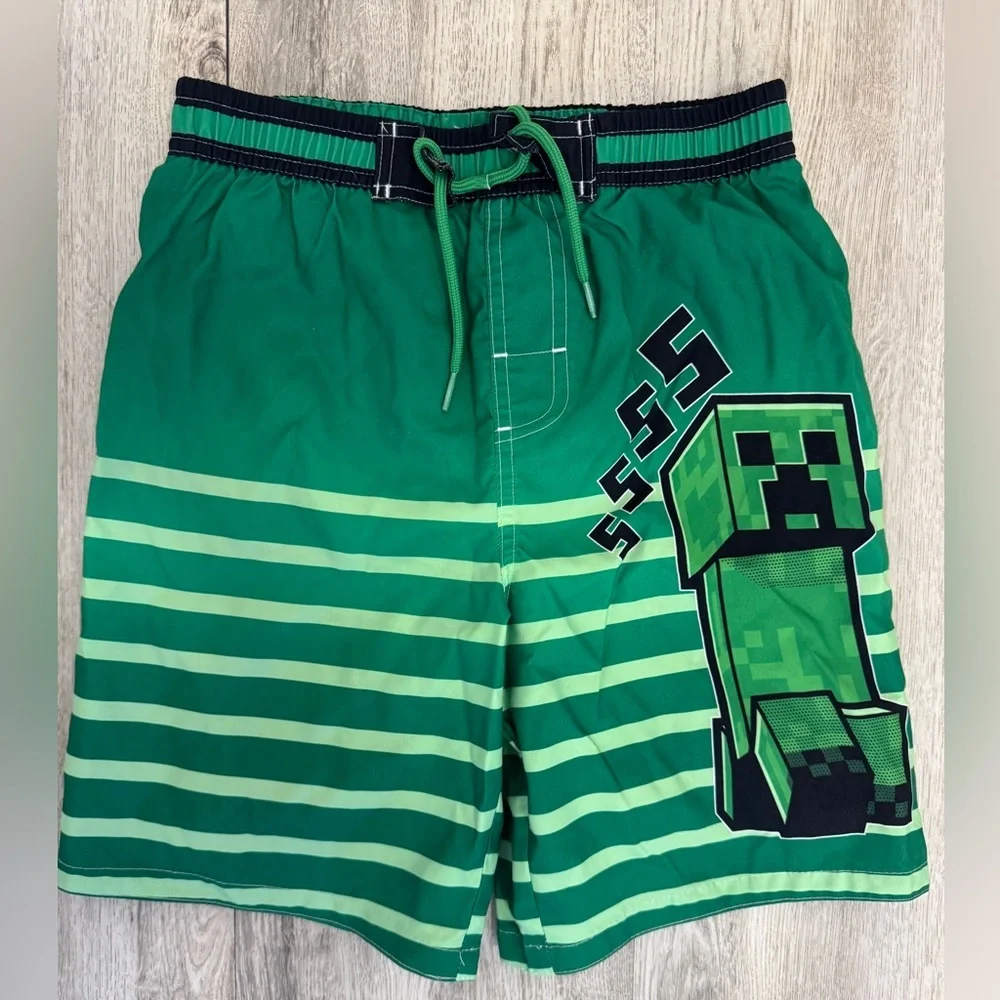 Vibrant Green and Black Minecraft  Swim Trunks with Pixelated Design size 10/12